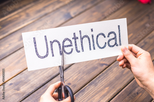 Obraz na płótnie unethical to ethical by scissors