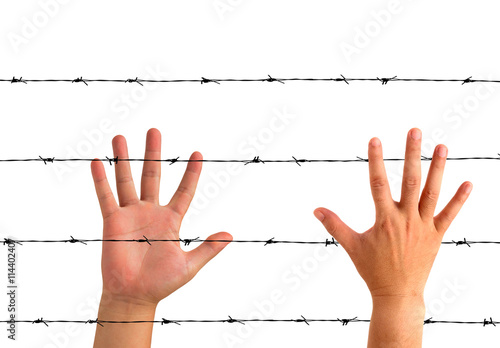 isolated Grab the hand and black barbed wire