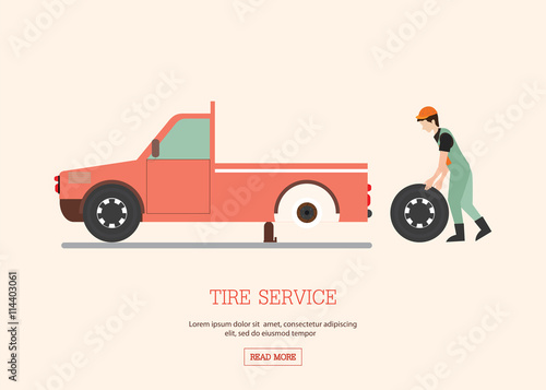 man worker changing tire.