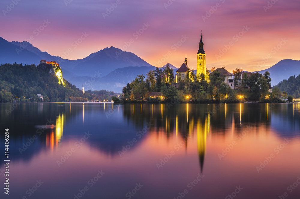beautiful, multicolored sunrise over an alpine lake Bled in Slovenia
