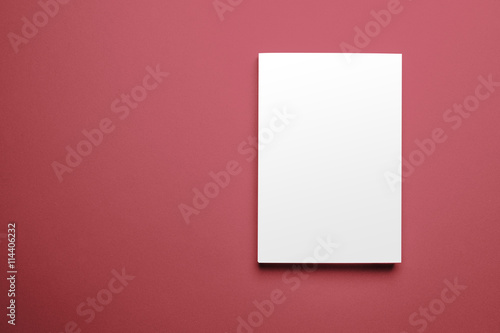 Blank magazine cover template on red background with clipping path