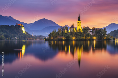 beautiful, multicolored sunrise over an alpine lake Bled in Slovenia
 photo