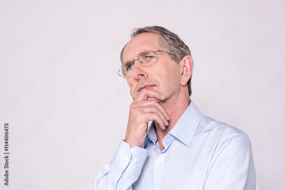 Portrait of thoughtful mature man. Portrait of thoughtful mature man.