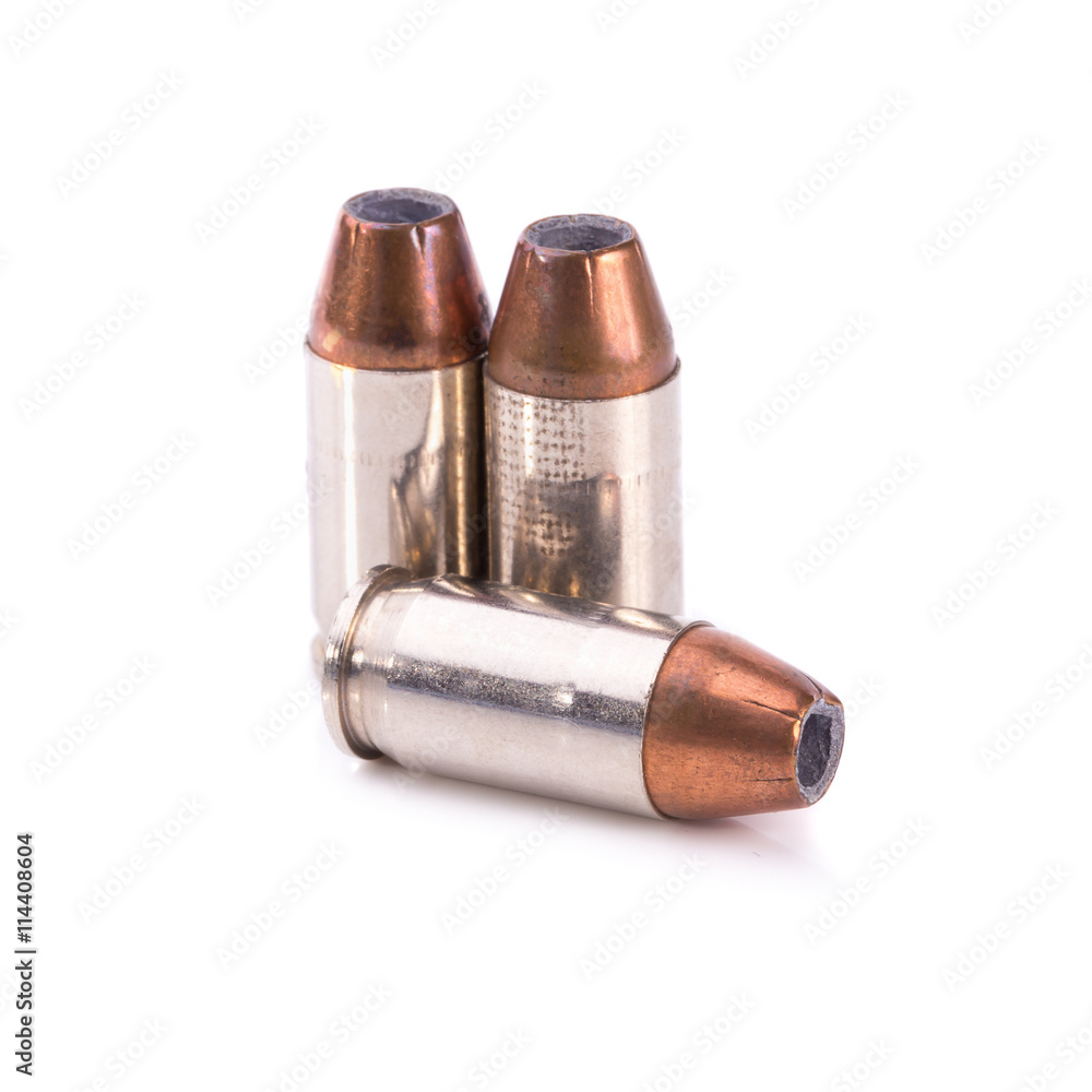 9mm bullet for a gun isolated on white background 9mm bullet for a gun isolated on white background