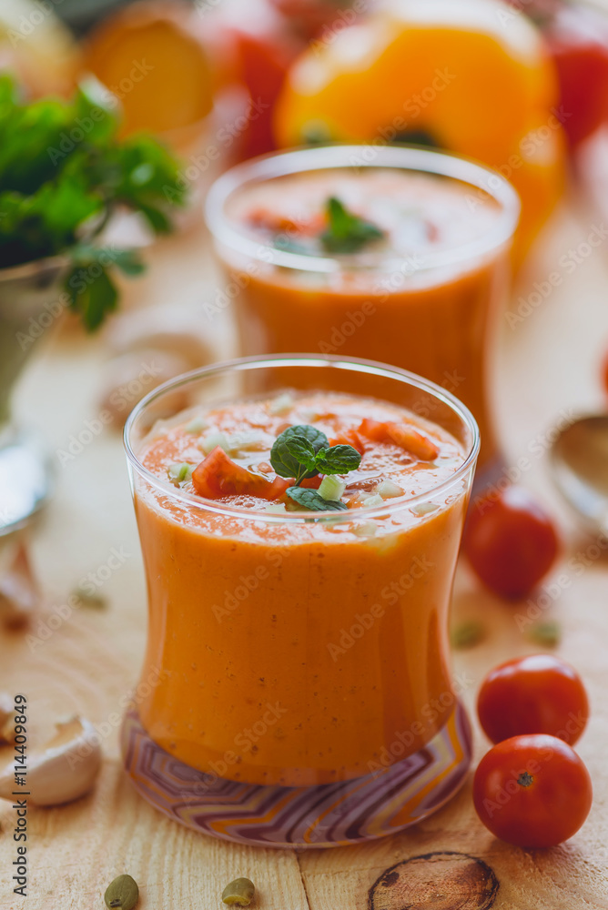 A refreshing cold gazpacho in glassware A refreshing cold gazpacho in glassware
