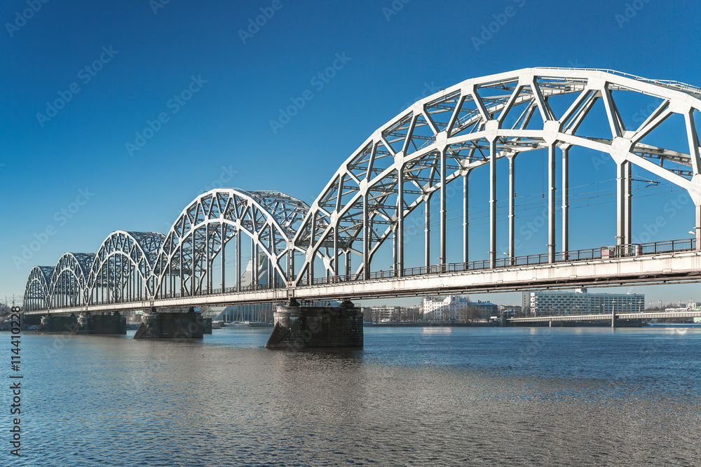 Fototapeta premium A view of the Railway Bridge over Daugava River in Riga, Latvia