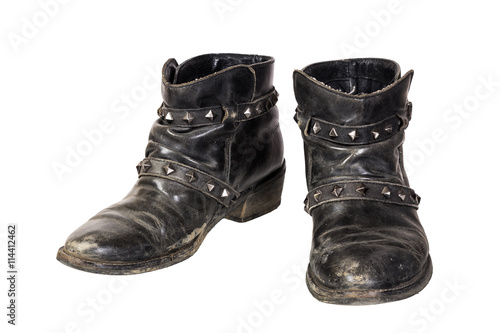 old dirty cowboy boots isolated on white background