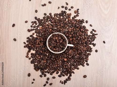 Coffee beans in cup