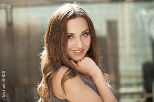 Closeup portrait of a happy young woman smiling