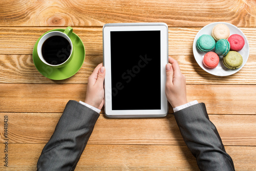 Businesswoman having coffee break photo