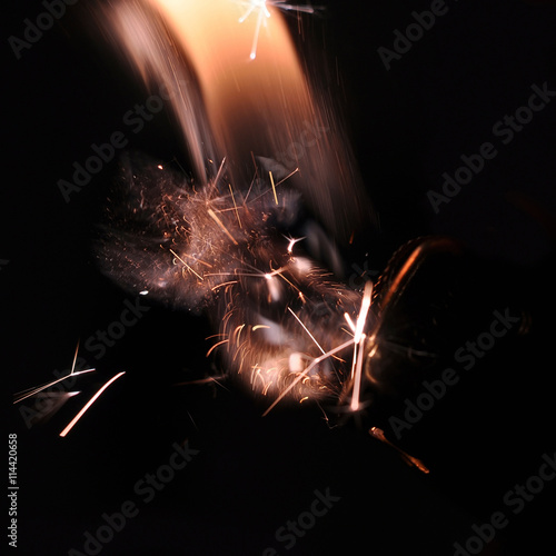 Square, flame, sparks, lighter, in the dark photo