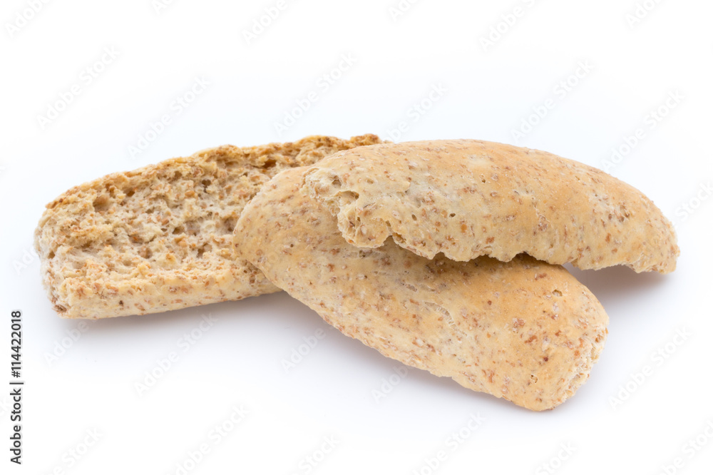 Dry flat bread crisps with herbs on a white background. Dry flat bread crisps with herbs on a white background.