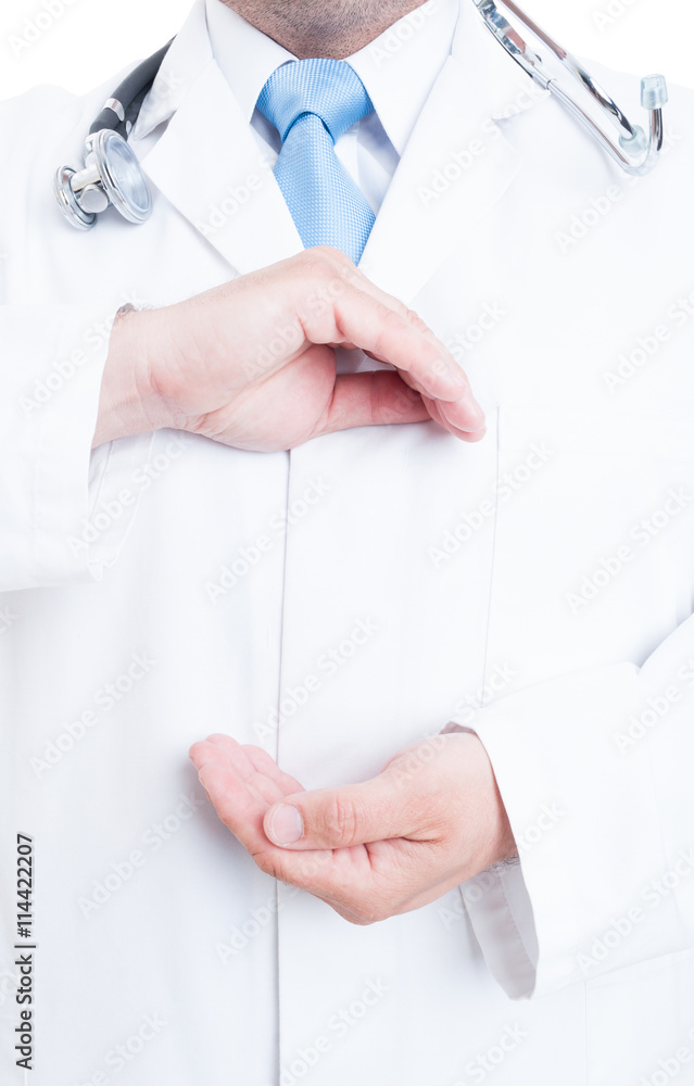Close-up of medic or doctor holding copyspace in chest area Close-up of medic or doctor holding copyspace in chest area