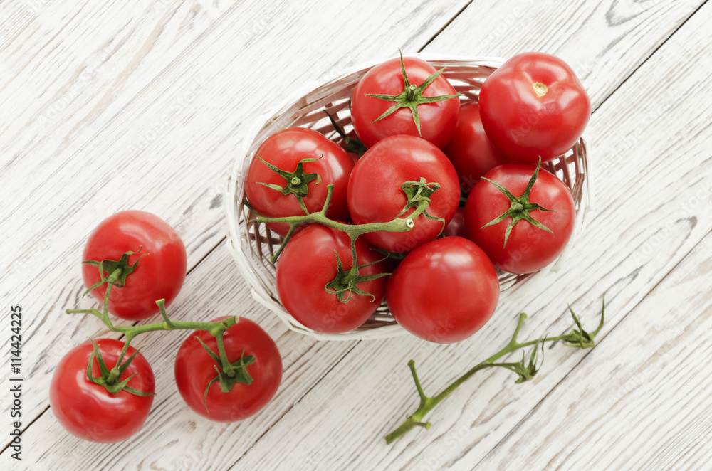Red tomatoes in the basket Red tomatoes in the basket