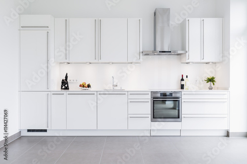 Modern kitchen design with white cabinets photo