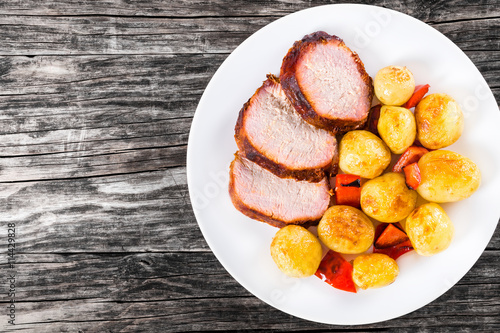 new potatoes Baked with pork tenderloin in a baking dish