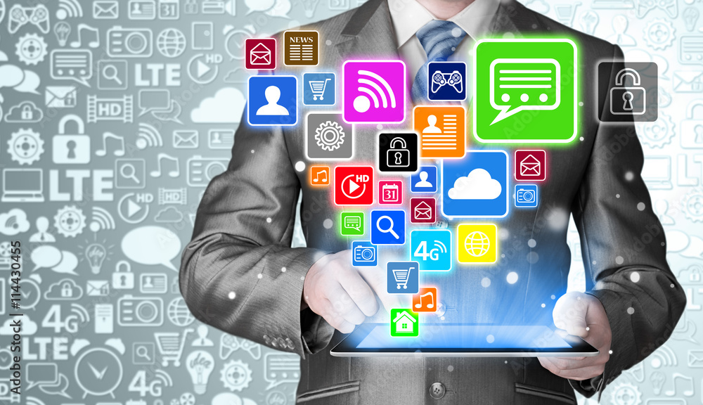 Business man using tablet PC with social media icon set Business man using tablet PC with social media icon set