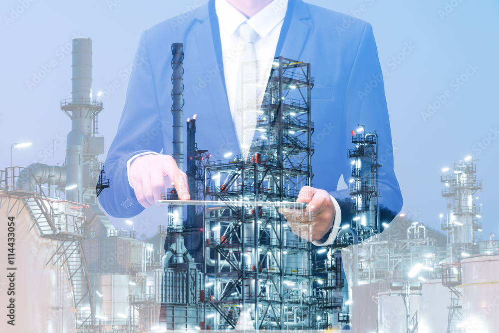 Double exposure of businessman hand hold tablet Double exposure of businessman hand hold tablet