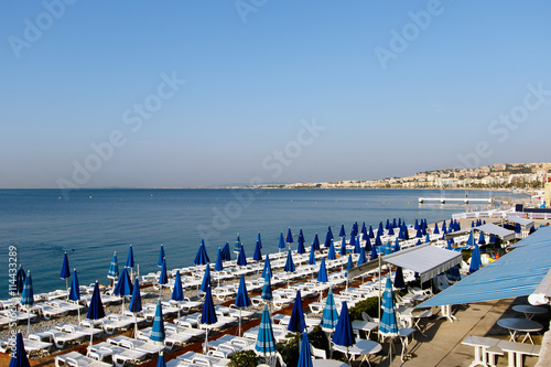 Blue morning on the beach in Nice, France on the French Riviera Mediterranean coast on the Promenade des Anglais. Horizontal with copy space for text  © Richard McGuirk