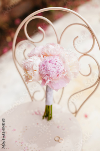 gentle wedding bouquet peonies with rings