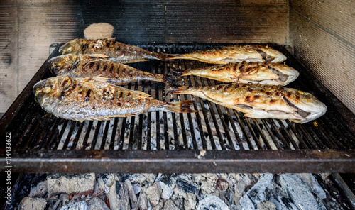 Preparing Fish on the charcoal grill