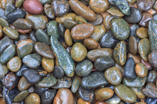 Wet stone texture around the river