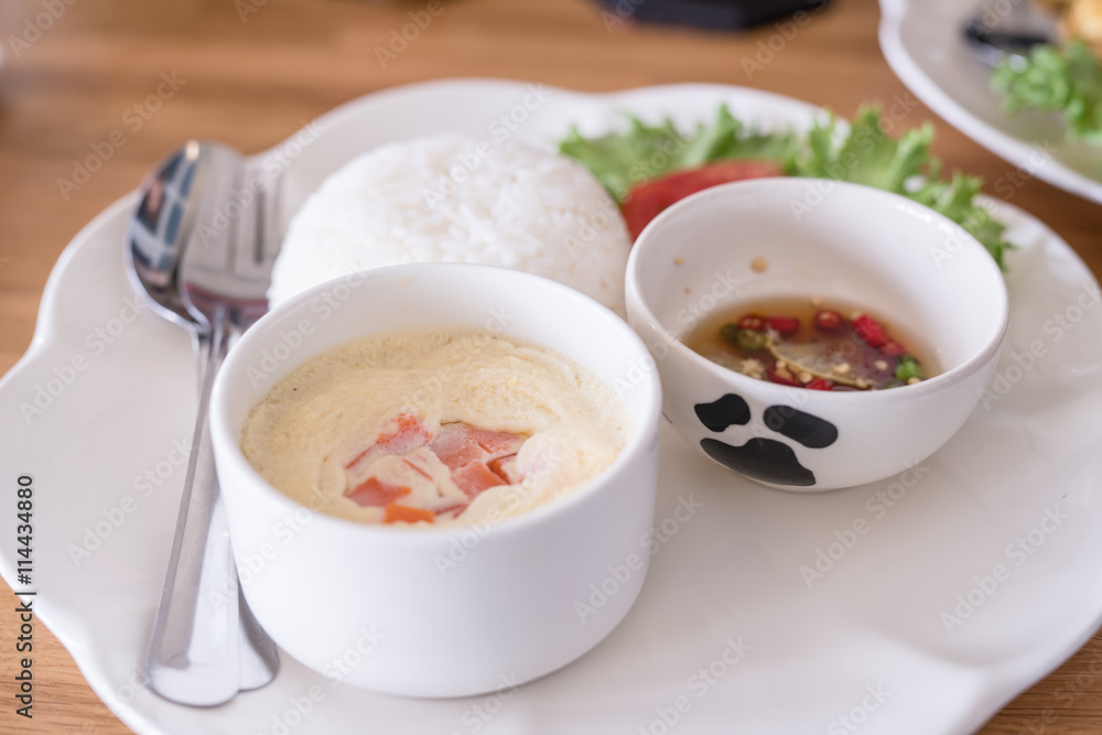 boiled rice with steamed eggs on wood table boiled rice with steamed eggs on wood table