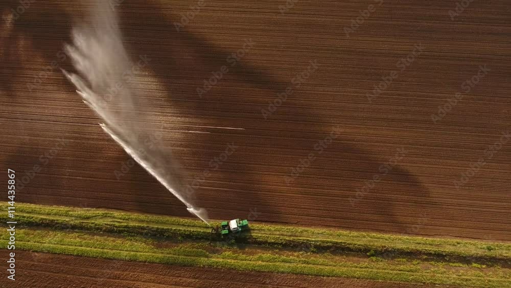 Irrigation equipment watering freshly seeded field.Irrigation of ...