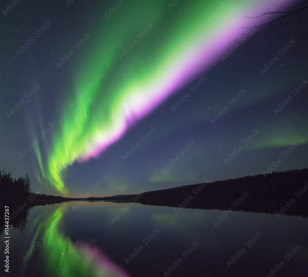 Aurora borealis over lake, Finland Aurora borealis over lake, Finland