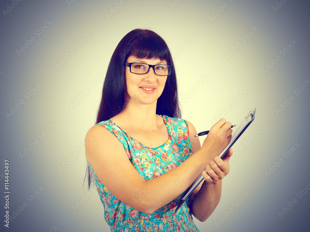 Young woman sign the document. Young woman sign the document.