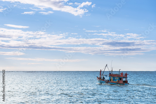 Fishing boat go to working