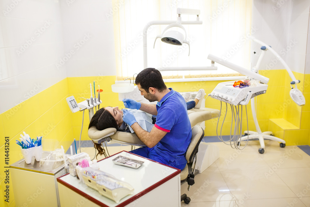 Obraz premium The patient at the dentist.