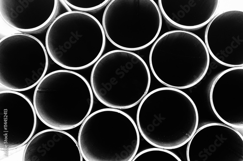 The tube profile the circle tube profile in black and white effect.The pile cross section of circle steel tube in black and white scene.The stack of circle steel pipe in black and white effect.