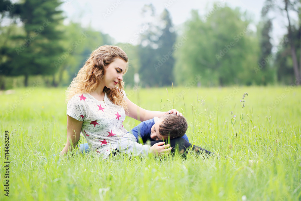Fototapeta premium mother gently stroked her son
