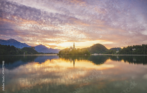 beautiful, multicolored sunrise over an alpine lake Bled in Slovenia 