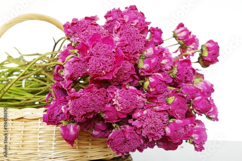 dried peonies/bunch of dried peonies in the basket