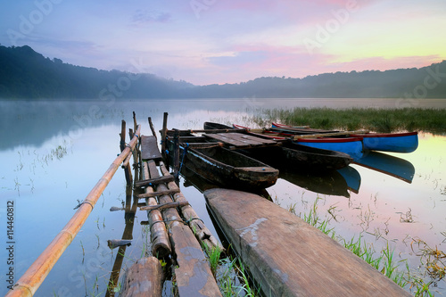 Boats on tamblingan lake, bali, indonesia photo