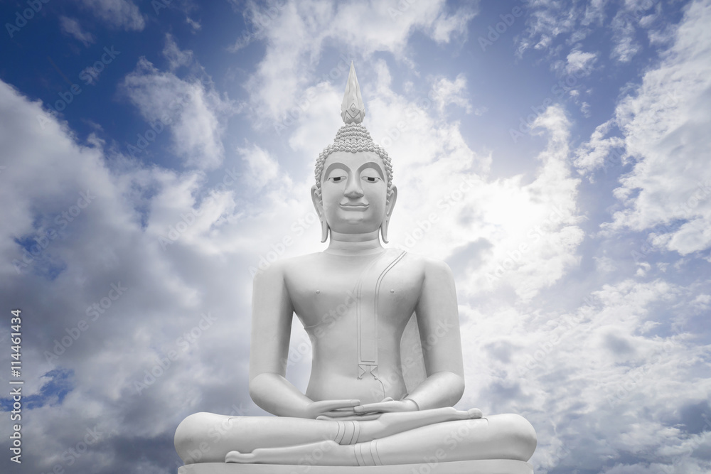 white image of Buddha with blue sky and cloud in background, light effect added ,filtered image , prachuapkhirikhan,thailand white image of Buddha with blue sky and cloud in background, light effect added ,filtered image , prachuapkhirikhan,thailand