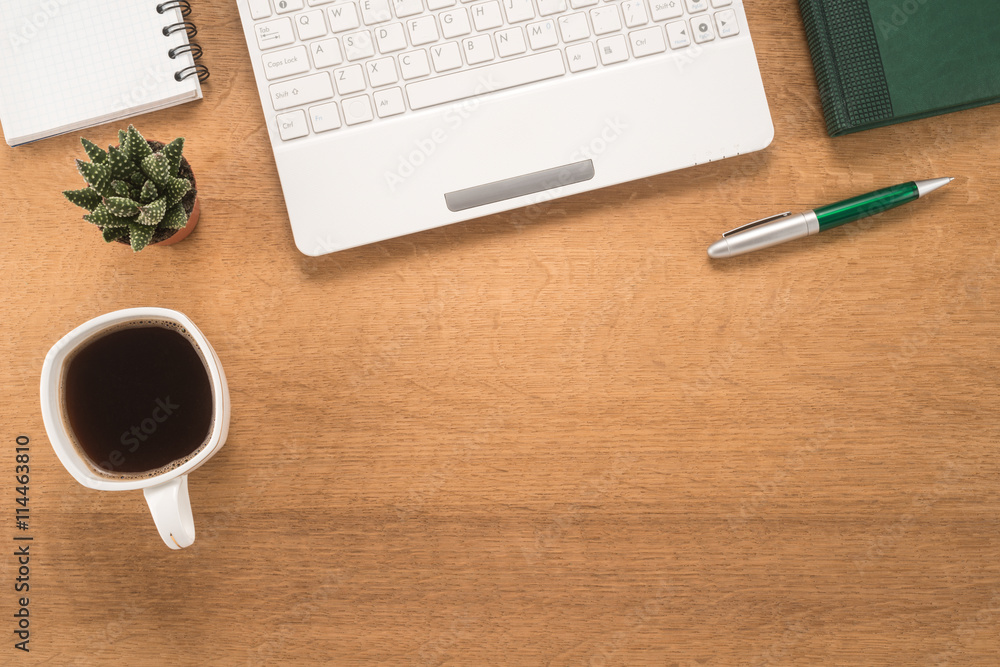 Office table with cup of coffee Office table with cup of coffee