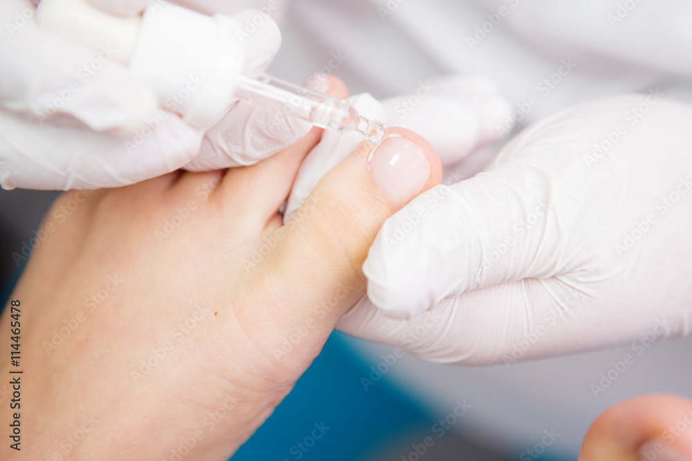 Close up pedicure process Close up pedicure process