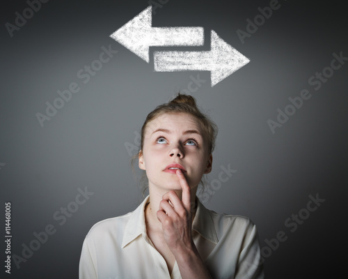 Girl in white and two arrows.