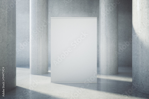 Blank billboard in concrete interior
