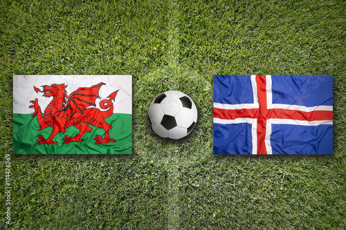Wales vs. Iceland flags on soccer field