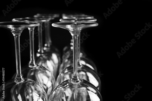 Empty wine glasses on black background, closeup