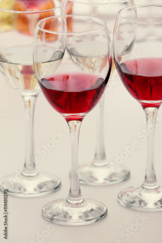 Wine glasses with red and white wine, closeup