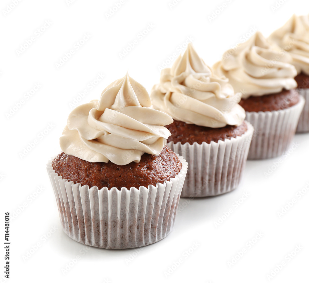 Tasty chocolate cupcakes, isolated on white Tasty chocolate cupcakes, isolated on white