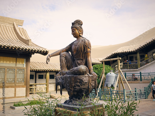 Bild auf Leinwand Buddha Statue at the Crescent Moon Pagoda in Dunhuang on the Silk Road (Gansu Pr