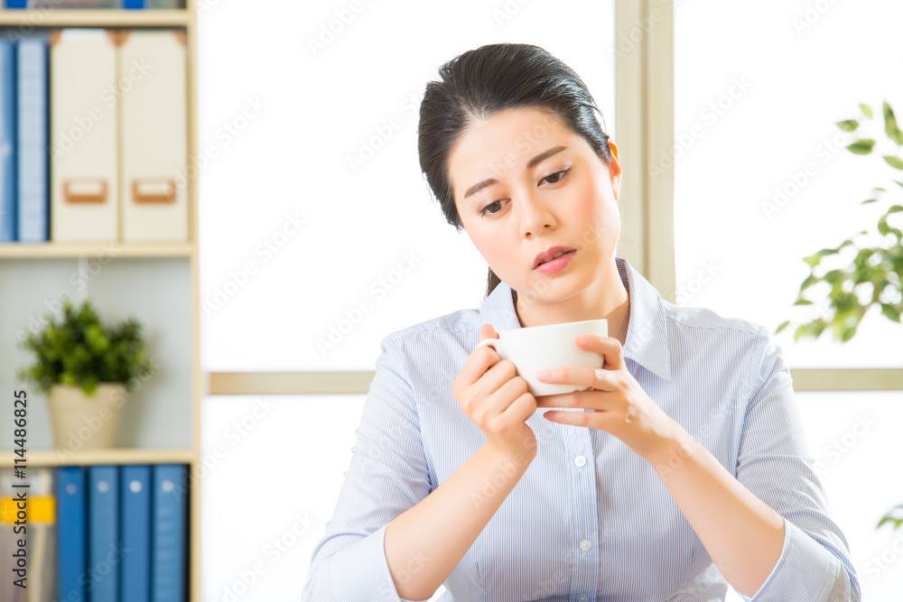 Young asian business woman overworked with uncomfortable Young asian business woman overworked with uncomfortable