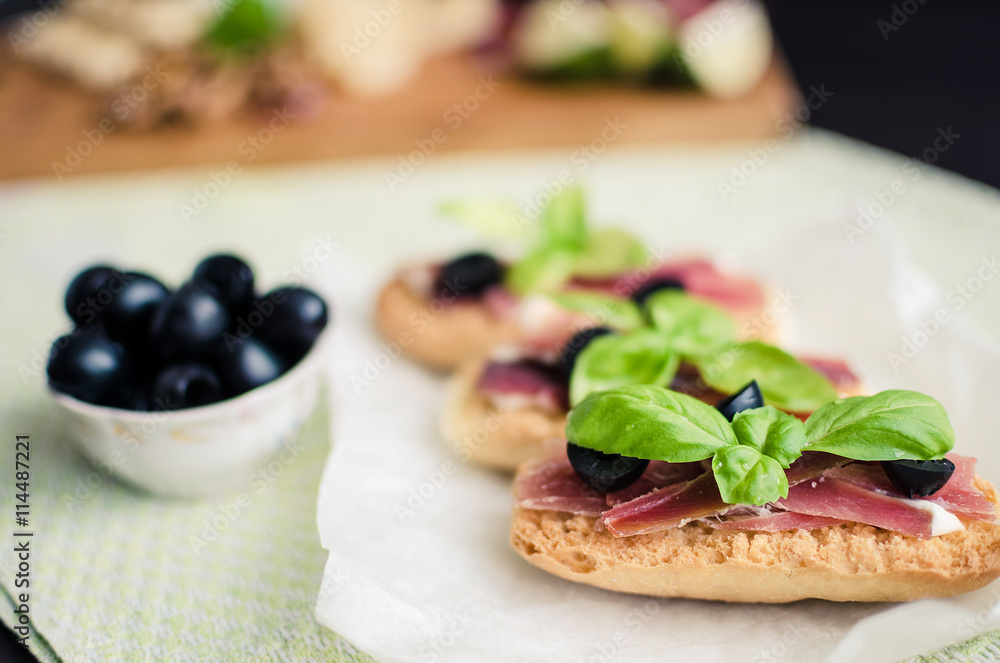 Delicious bruschetta with prosciutto Delicious bruschetta with prosciutto