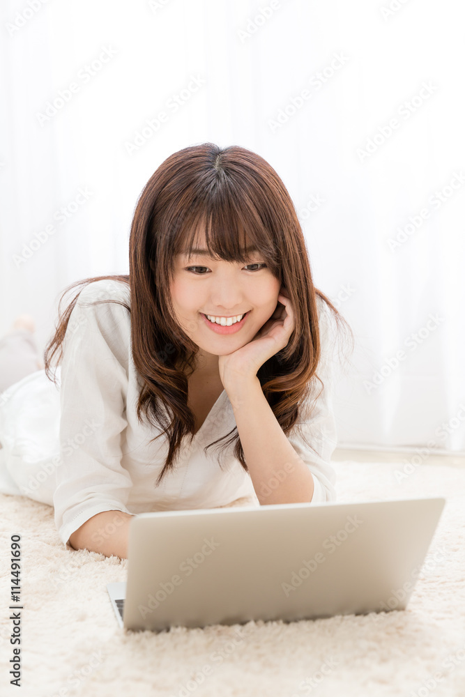 attractive asian woman using laptop attractive asian woman using laptop